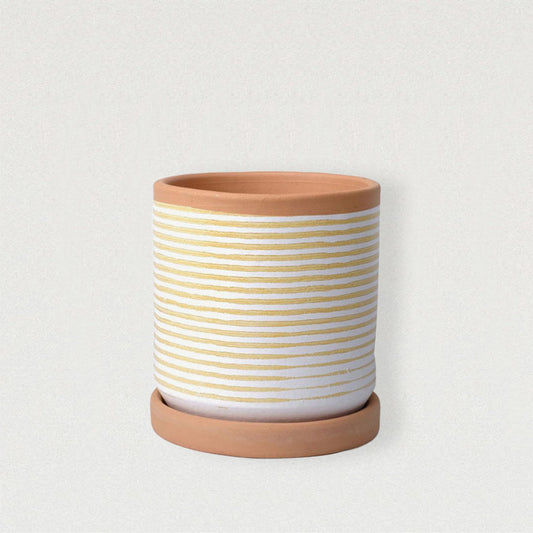 Handgedrehter Blumentopf Ino in warmem Rot mit sonnig-gelben Streifen und passendem Unterteller für stilvolle Pflanzenpräsentation